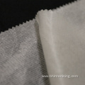 Polyester reinforced stitch bond nonwoven fusing interlining